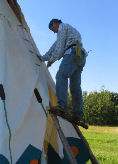 Putting the tipi cover together with lacing pins