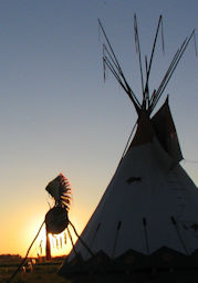 Sunbset Native American Tepee with Feather Warbonnet and War Shield 